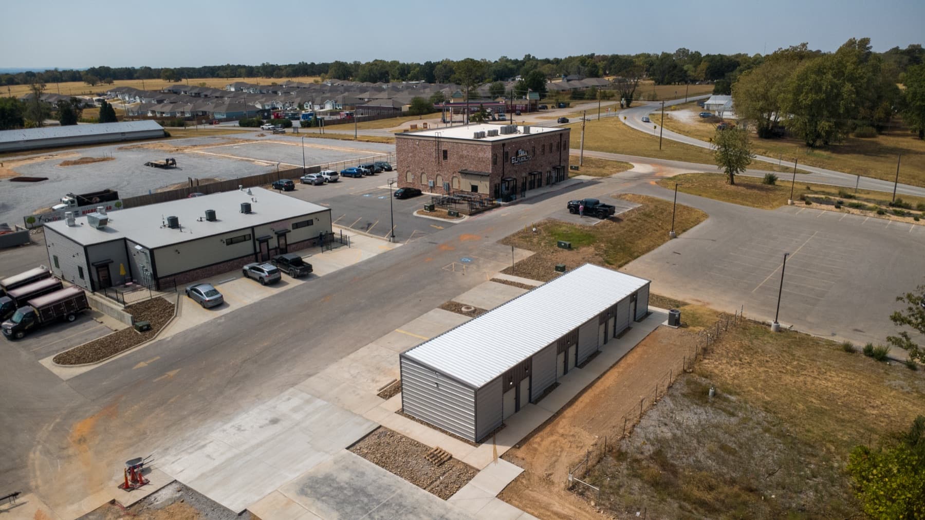 Aerial view of Highfill Storage Co. with El Pueblito and Highway 12 behind it